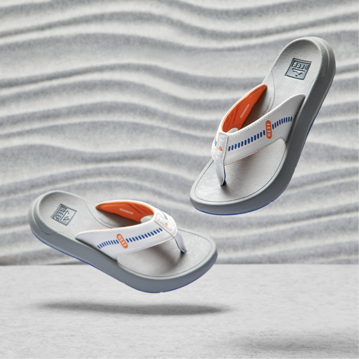 CJ5891_Swellsole_cruiser_Blue_White_Orange_abovethefold2.jpg