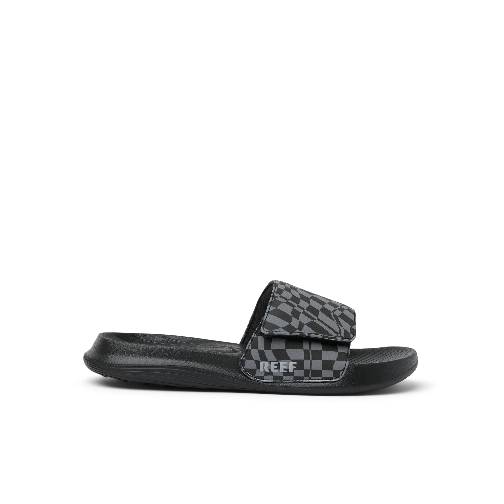 CJ9122_KIDS_SALTY_SLIDE_BLACK_SWELL_CHECKER_RS_SHADOW.webp