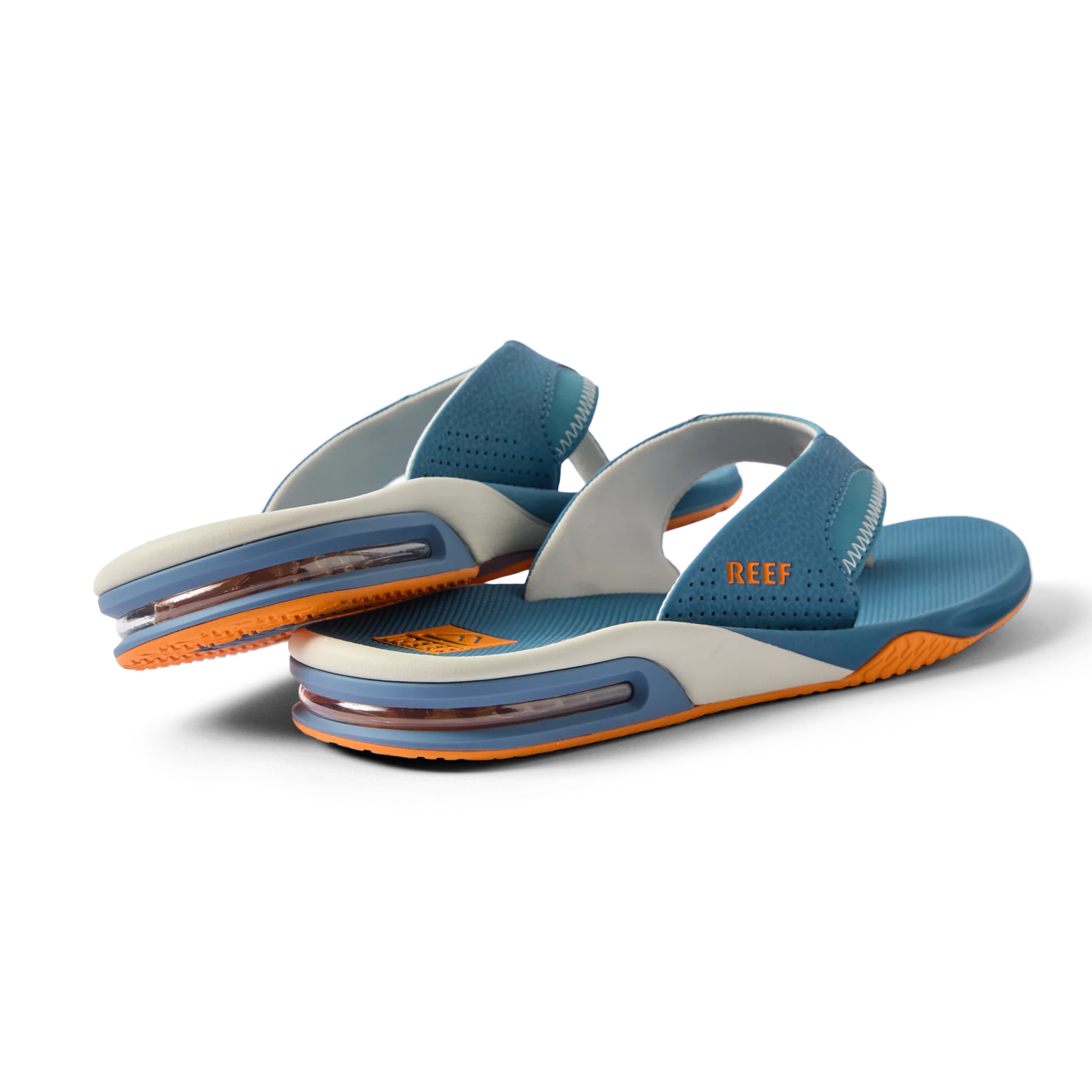 CJ9614_FANNING_STEEL_BLUE_MARIGOLD_8878_WB-2500x2500-83e7224_1.webp